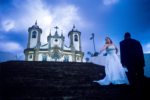 A bride poses for pre-nuptial photos near the Church of Nossa Senhora da Conceição, or Our Lady of the Immaculate Conception, in Ouro Prêto, Brazil. © Kevin Moloney, 2009