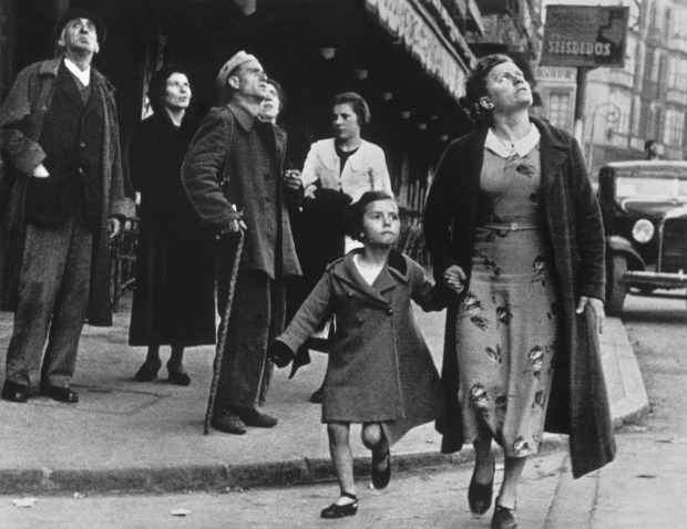      Running for shelter during the air raids. Bilbao, Spain, 1937. © Estate of Robert Capa and Magnum Photos.